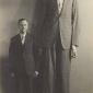 The tallest man to have ever lived, standing next to his father