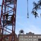 This is 20 story crane. Lifting a guy's lunch.