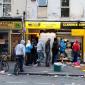 British People Queuing During The London Riots