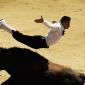 A 'Recortador' leaps over a bull